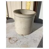 Stonework crock with crack