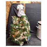 Christmas tree with angel tree topper