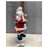 Battery operated lighted musical Santa Claus