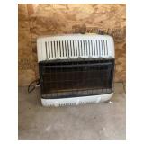 Propane wall heater approximately 24 x 25 x 8"