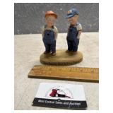 Porcelain farm boys figurine