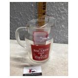 Glass, Bacardi, rum, and Coca-Cola pitcher