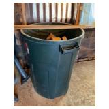 Trash can and wood scraps