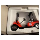 Camp Courageous die cast golf cart bank