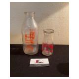 AE and Flynn milk bottles