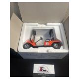 Camp Courageous die cast golf cart bank