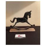 Cast iron rocking horse door stop