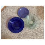 Blue glass bowl and various dishes