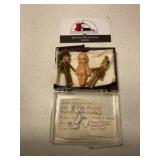 Celluloid Kewpie doll and solider pins