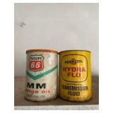 Vintage Phillips 66 and pennzoil oil cans