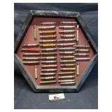 Framed vintage advertising bullet pencils