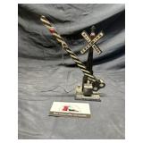 Metal railroad crossing arm