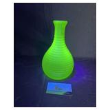 Frigidaire green uranium ribbed glass bottle -