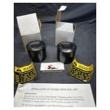 Double tang fuel caps