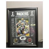 Framed Green Bay packers memorabilia