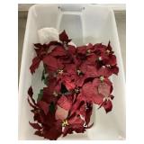 Artificial poinsettias and decor