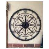 Clock approximately 25 inches across.