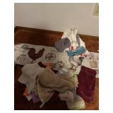 Table runner with miscellaneous kitchen towels,