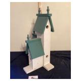 Bird houses approximately 25 inches tall