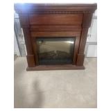 Large Electric fire place with mantle and surround