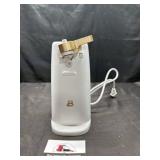 Drew Barrymore electric can opener