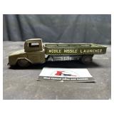 Vintage tin litho mobile missile launcher truck