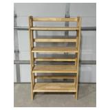 Folding wooden shelving unit