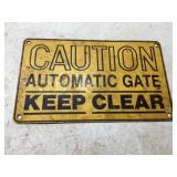 Metal gate sign