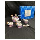 Mother Goose ceramic teapot and 4 cups