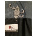 Cast-iron coat hanger