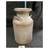 Cream can approximately 21 inches tall