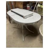 Chrome, oval table with one leaf Unassembled,