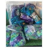 Tote of yarn and crocheted items