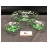 Green glass bowl and candle holders