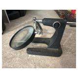 Magnifying glass on stand