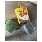 Watering cans and 1/4 bucket of Preen