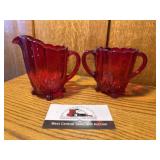 Red glass cream and sugar