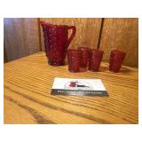 Red glass hobnail miniature pitcher and glasses