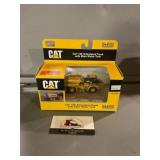 Cat 730 Articulated Truck with Klein Water Truck