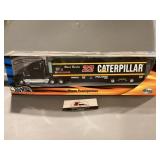 Hot Wheels CAT team transporters