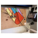 Landline phone, cork board, clock, shelf