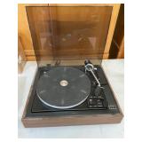 Record player/ turns on