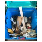 Tote of paint supplies