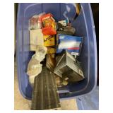 Tote of car parts, oil filters, head light