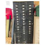 Metal hardware organizer full of hardware buyer