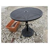 Metal table, umbrella base and planter