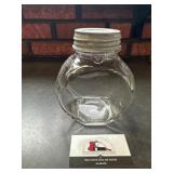 Glass canister with zinc lid