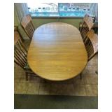 Oak dining room table and chairs