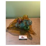 Amber glass dish with glass fruit