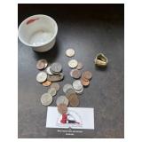 Pocket change and $1 bill ring